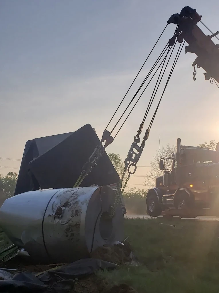 Burrows recovery truck lifting heavy industrial equipment