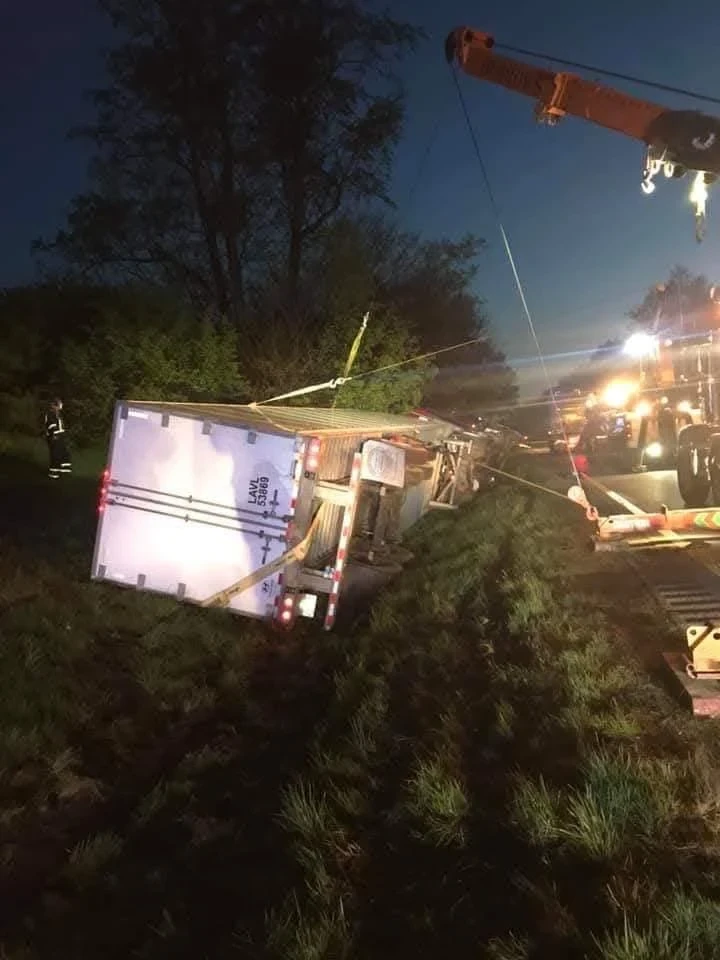 Burrows crew using a crane during an overnight trailer recovery